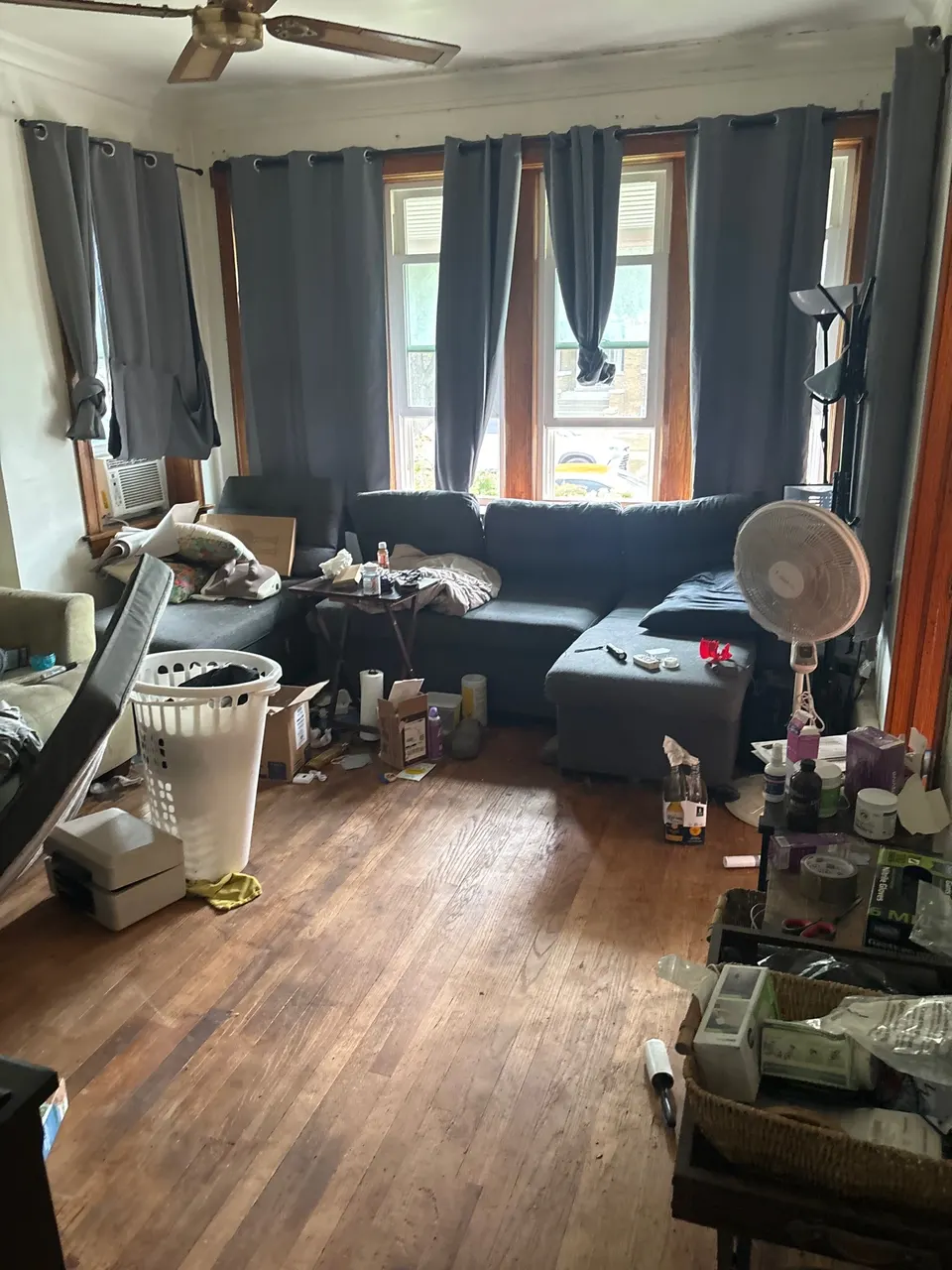 Archer Heights living room with items remaining before the as-is closing